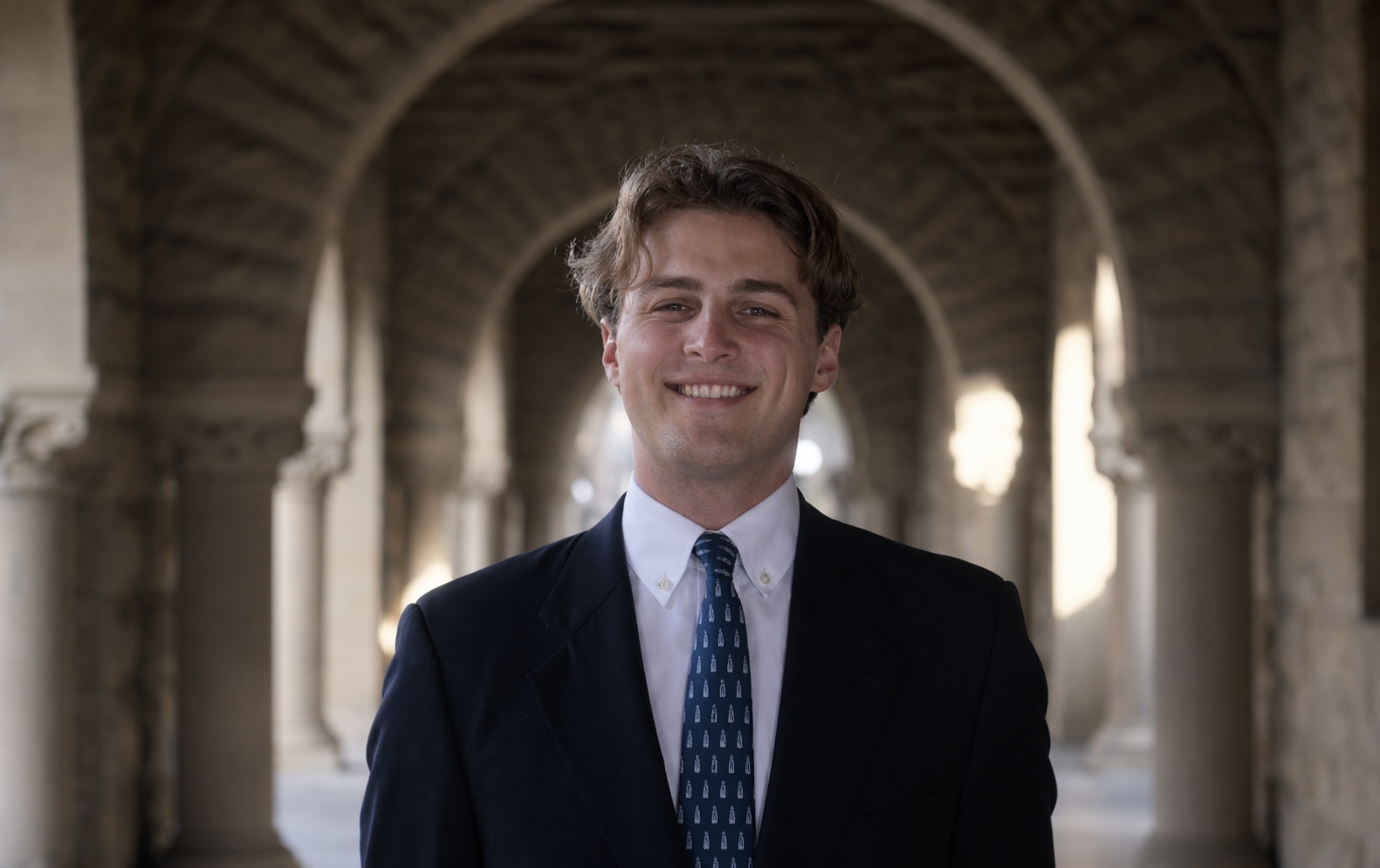 Portrait of Lucas Lippey in the Stanford arcades
